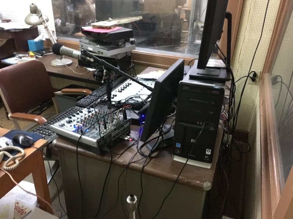 WERH broadcast studio with a mixing board and microphone