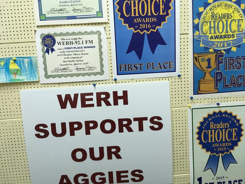 WERH awards and community recognition displayed on a wall